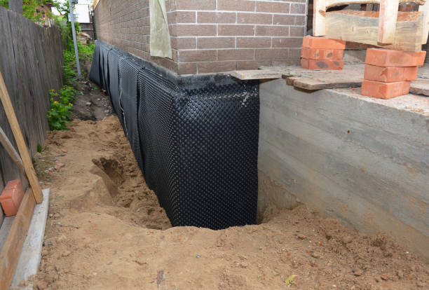 Happy homeowners after waterproofing job in Gaylesville